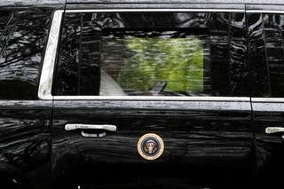 President Donald Trump was spotted using his phone as he departed Trump National Golf Club in Sterling, Virginia